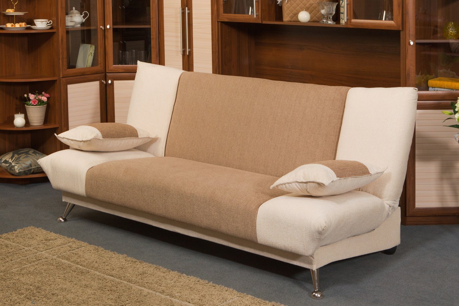 Сохраняйте пространство: диван-книжка в интерьере маленькой квартиры
